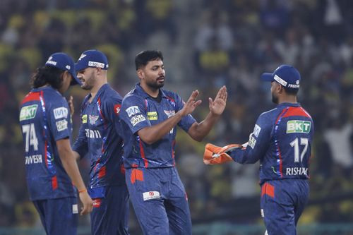 Avesh Khan celebrates picking a wicket with his teammates- Source: Getty