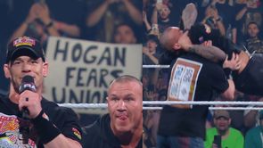 John Cena reacts after Randy Orton attacks him on WWE RAW