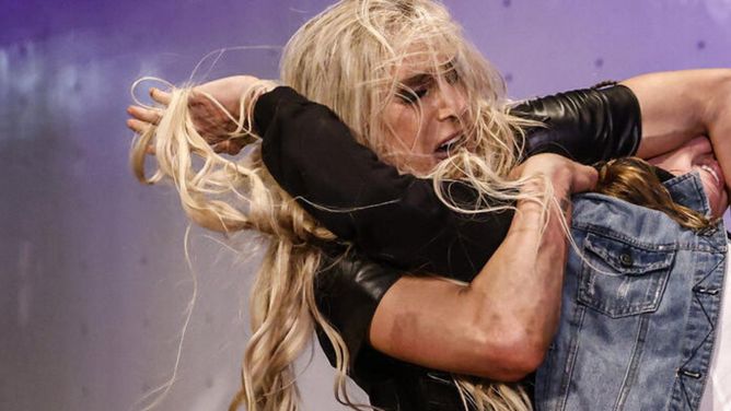 Charlotte Flair viciously attacks Tiffany Stratton in the parking lot as fight breaks out before WWE SmackDown in fan video; champion left crying