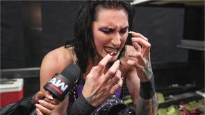 Rhea Ripley ambushed from behind during match by former champion