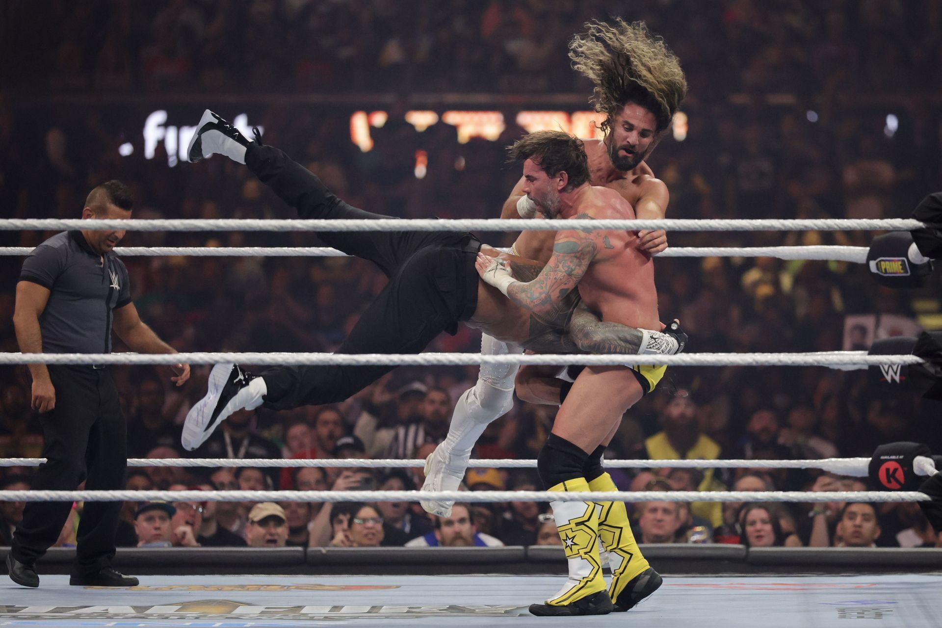 Seth Rollins, Roman Reigns, and CM Punk at WrestleMania 41. [Image via Getty]