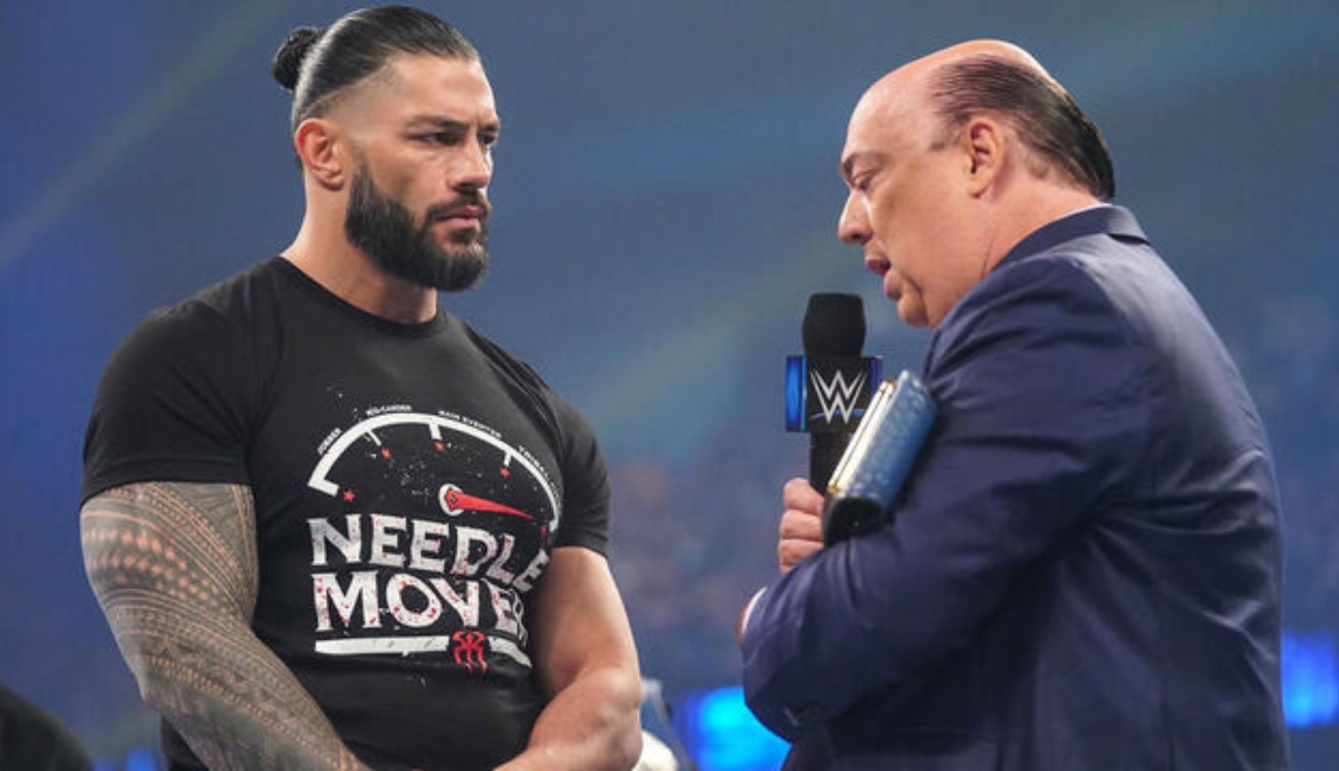 पॉल हेमन से बात करते हुए रोमन रेंस (Photo: WWE.com)