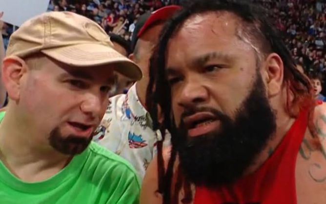 Former WWE superstar finally "reveals" why the Green Shirt Guy always gets front row tickets to shows