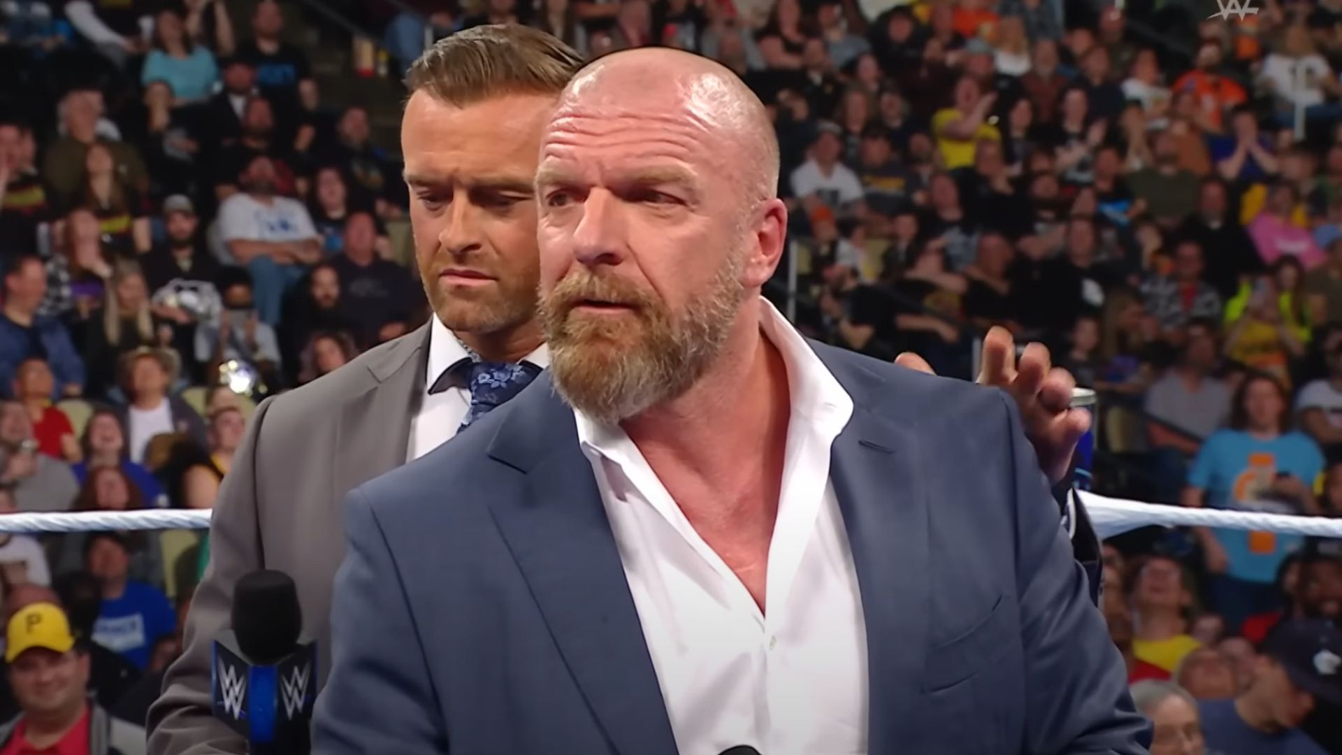 SmackDown General Manager Nick Aldis (left) with WWE
