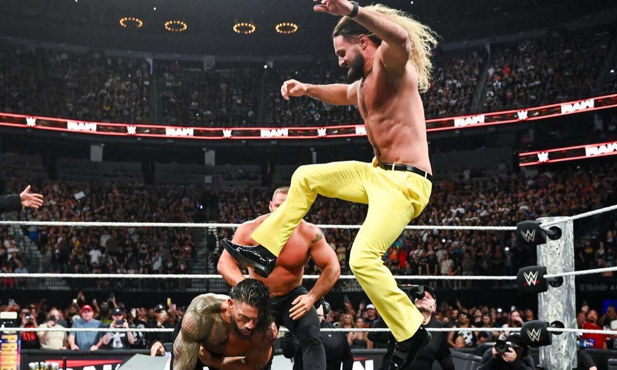 WWE superstar Seth Rollins attacking Roman Reigns on RAW after WrestleMania 41. [Photo credit: WWE.com]