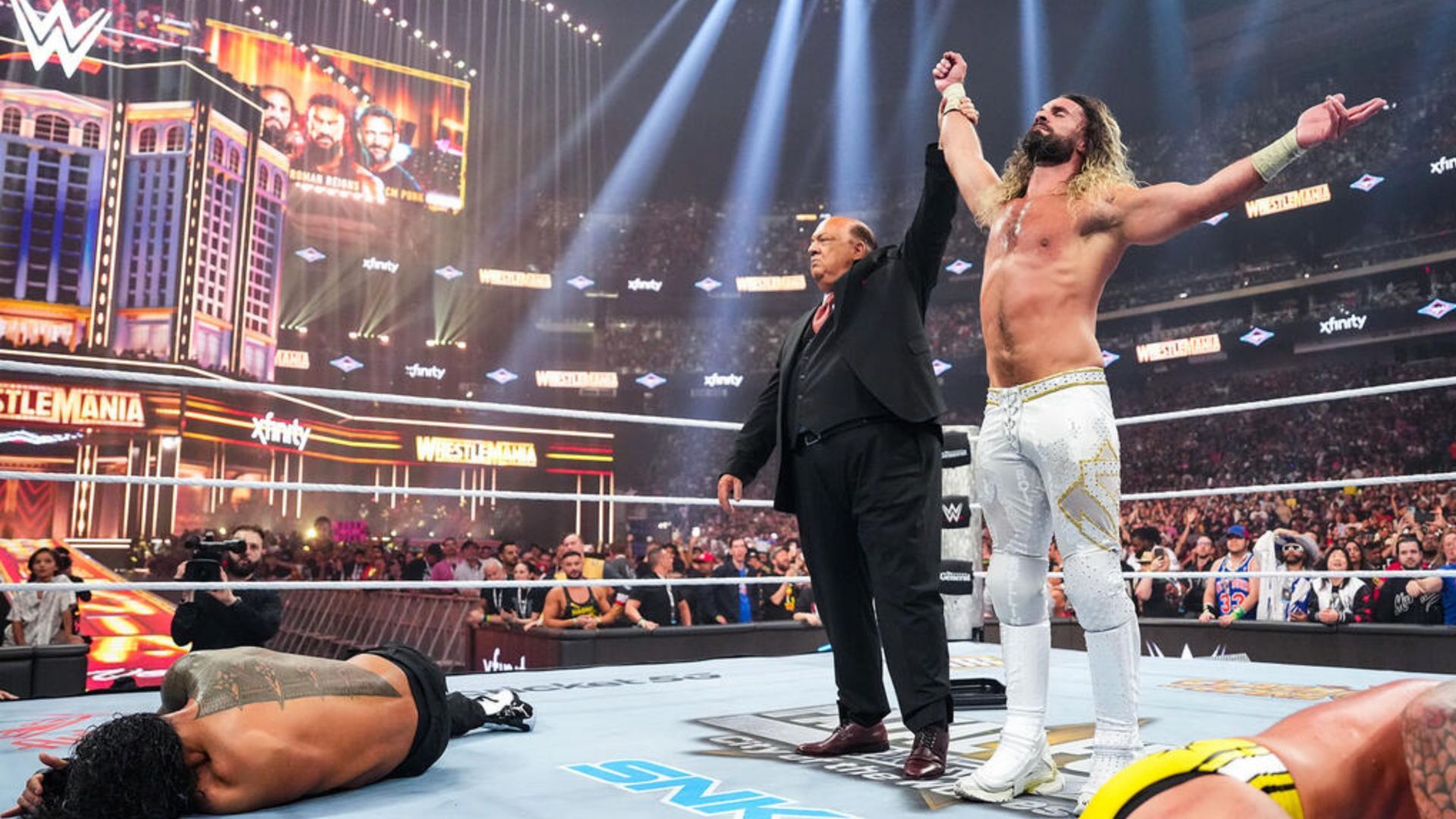 Seth Rollins and Paul Heyman laid out Roman Reigns at WrestleMania (Image credit: WWE.com)