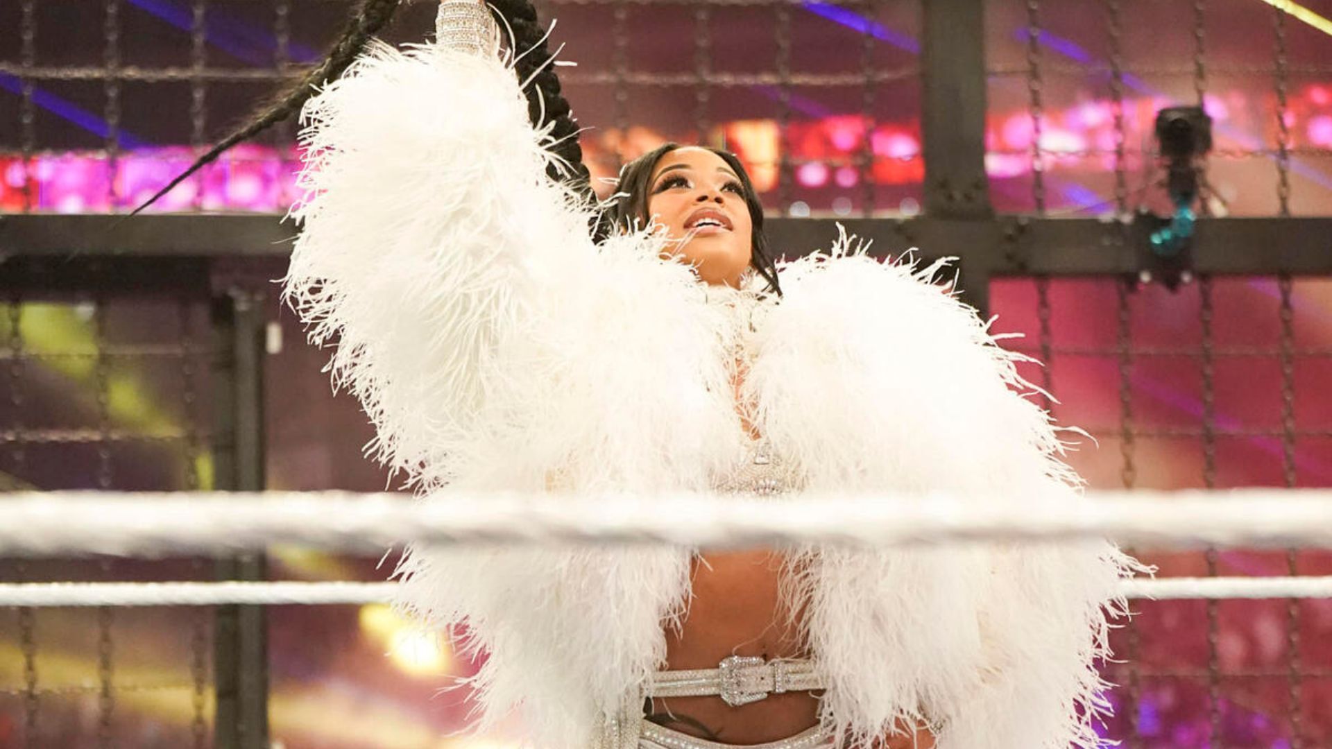 Bianca Belair (left), Belair vs. Tiffany Stratton (right) (Image Credits: WWE.com)