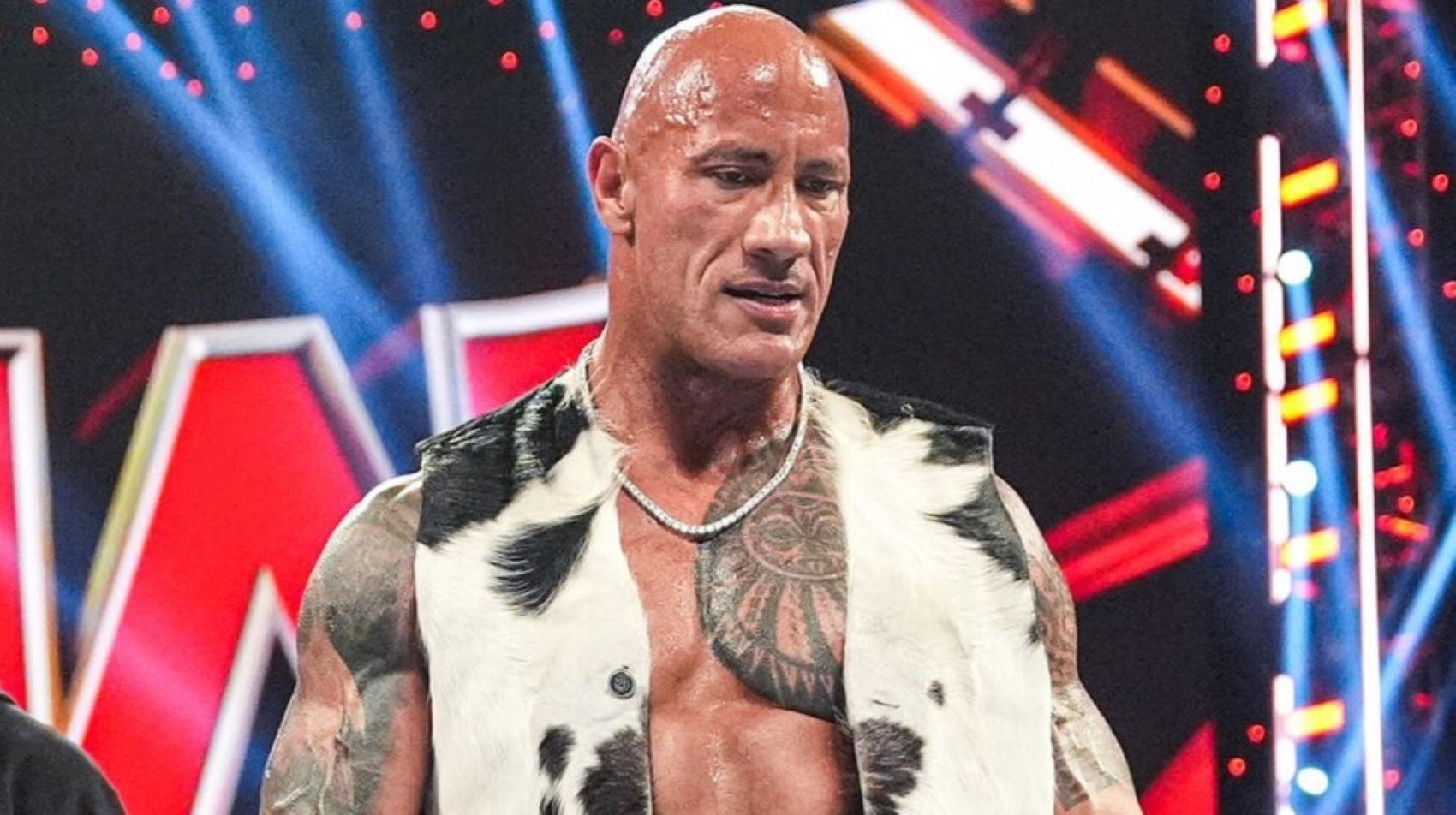The Rock is a WWE Legend (Image via WWE.com)