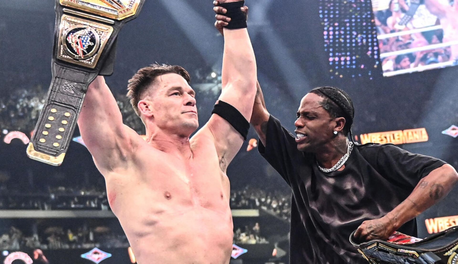 ट्रैविस स्कॉट, जॉन सीना की जीत सेलिब्रेट करते हुए (Photo: WWE.com)