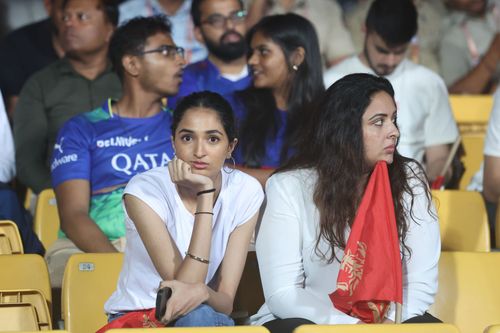 Spectators waits as toss is delayed due to rain prior to the 2025 IPL match between Royal Challengers Bengaluru and Kolkata Knight Riders at M Chinnaswamy Stadium on May 17, 2025, in Bengaluru, India. (Photo by Pankaj Nangia/Getty Images)