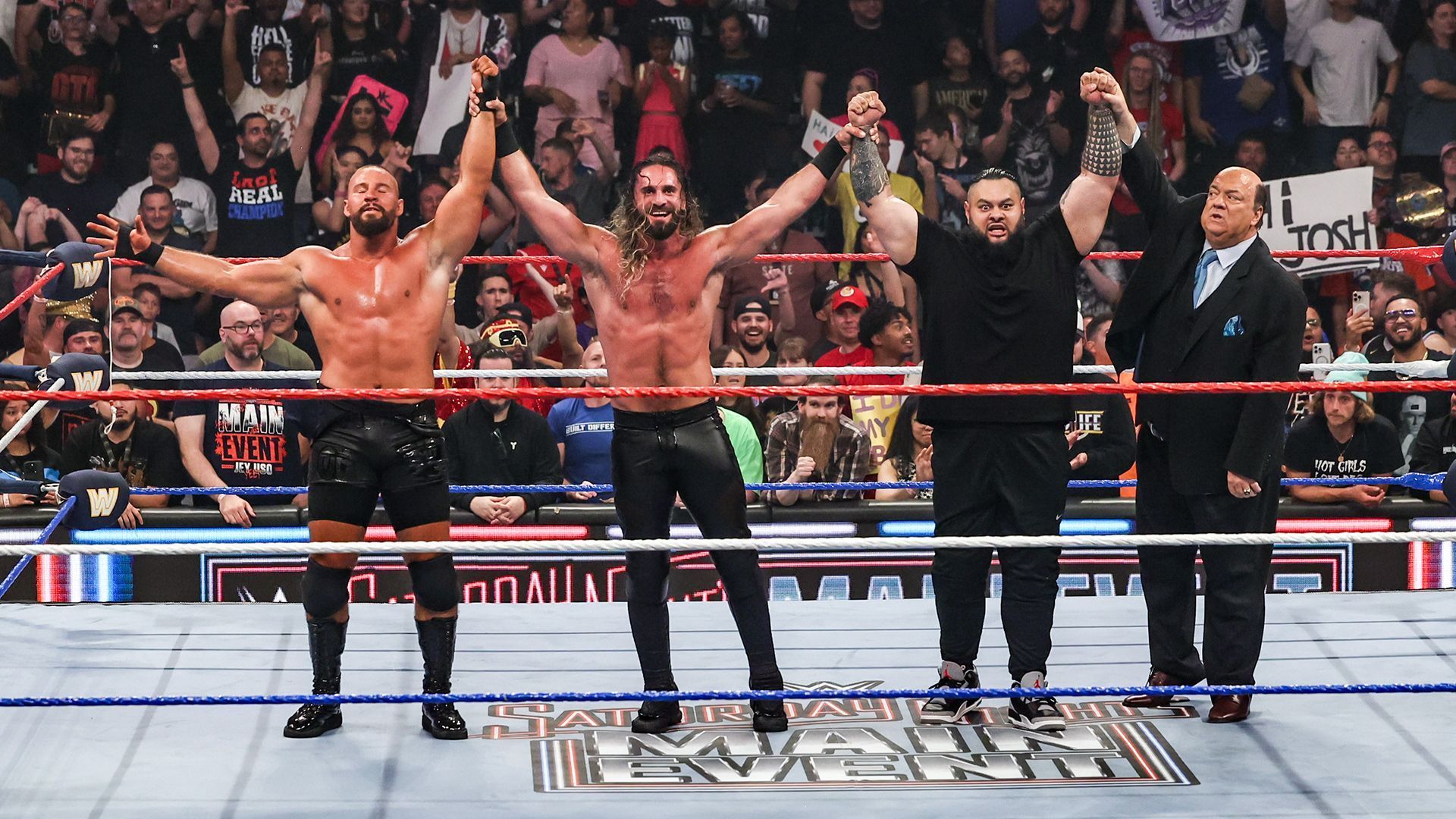 Bron Breakker, Seth Rollins, Bronson Reed, and Paul Heyman at WWE SNME