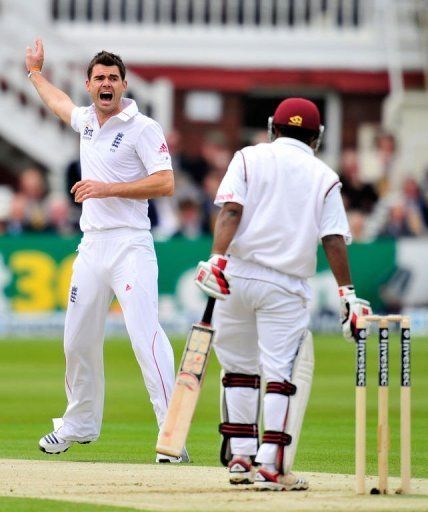England&#039;s James Anderson (L) appeals unsuccessfully for the wicket of West Indies batsman Adrian Barath