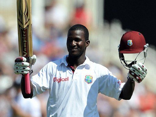 West Indies captain Darren Sammy celebrates after scoring his first Test century