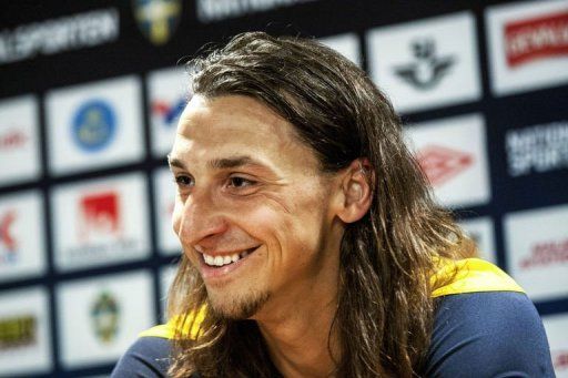 Swedish national soccer player Zlatan Ibrahimovic smiles during a press conference