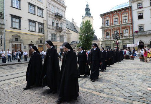 Nuns of the Ukrainian Orthodox Greek Catholic Church (UOGCC) stage a protest in Lviv