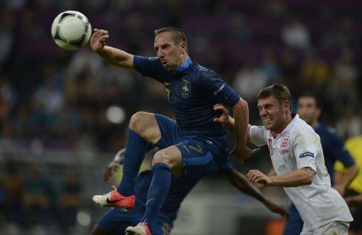 French midfielder Franck Ribery (L) vies with English defender Phil Jagielka