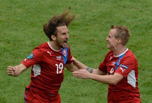 The Czech Republic kept their Euro 2012 hopes alive with a 2-1 win over Greece
