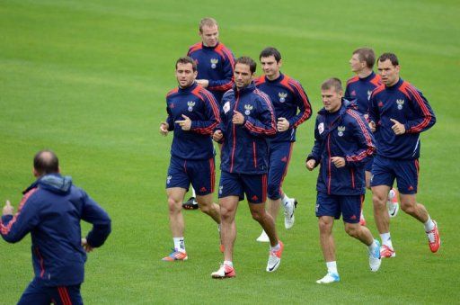 Russia&#039;s national football team players take part in a training session at the Victoria stadium in Sulejowek