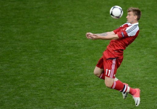 Danish striker Nicklas Bendtner scored both their goals against the Portuguese
