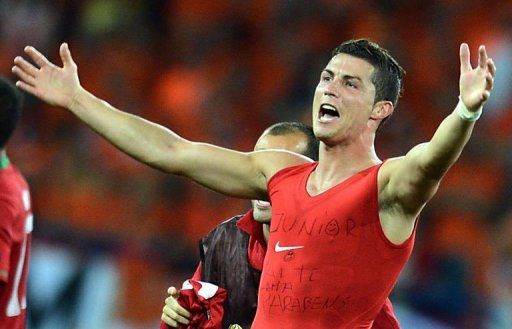 Portuguese forward Cristiano Ronaldo celebrates after beating Netherlands