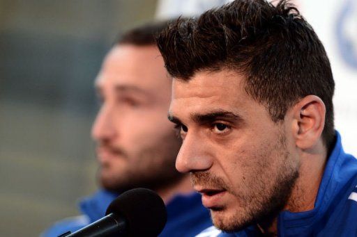 Greece&#039;s midfielder Konstantinos Katsouranis speaks during a press conference at the Municipal stadium