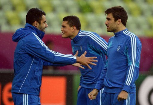 Greece are hoping for another Euro 2012 &#039;giant killing&#039; when they take on Germany in Friday&#039;s quarter-final
