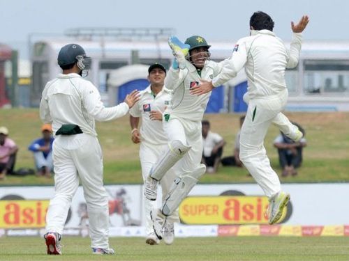 Pakistan's Saeed Ajmal (right) celebrates the dismissal of Sri Lanka's Tharanga Paranavitana (not in picture)