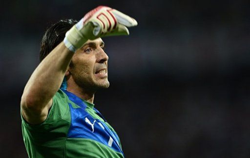 Italian goalkeeper Gianluigi Buffon reacts during the penalty shoot out