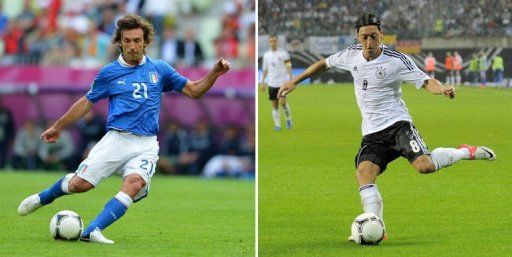 Italian midfielder Andrea Pirlo (L) and Germany&#039;s midfielder Mesut Oezil