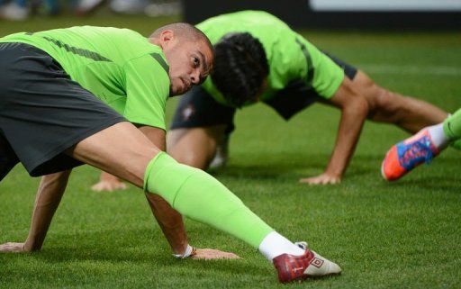 Portuguese defender Pepe stretches during a training session