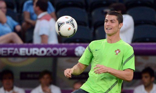 Portuguese forward Cristiano Ronaldo controls the ball during a training session