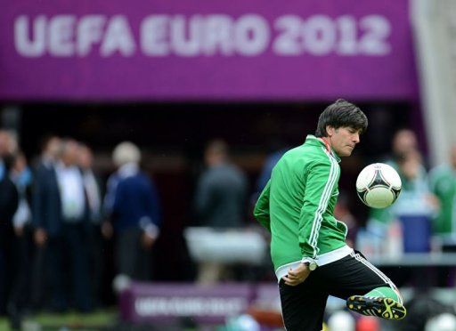 German head coach Joachim Loew takes part in a training session at the National stadium in Warsaw