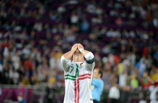 Portuguese forward Cristiano Ronaldo reacts after missing a goal opportunity