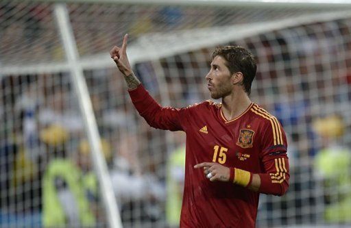 Spanish defender Sergio Ramos celerbates after scoring during the penalty shoot out