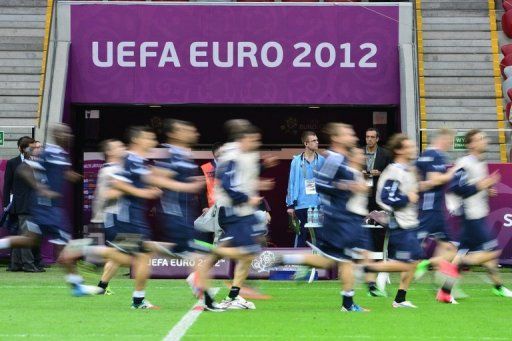 Italian players take part in a training session at the National stadium in Warsaw