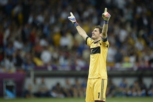 Spanish goalkeeper Iker Casillas celebrates after a third goal