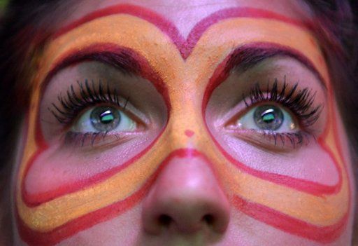 A Spanish supporter watches the final