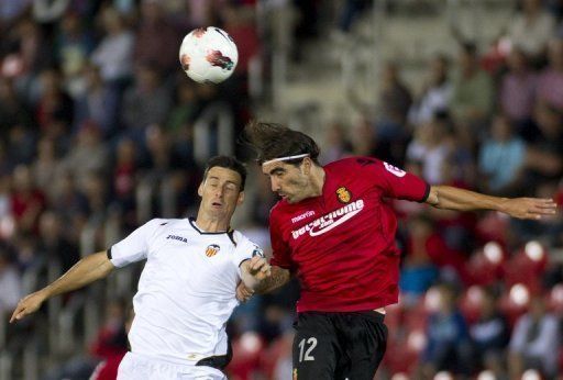 Laudrup knows Flores (pictured, R) after working with the centre-back at Real Mallorca