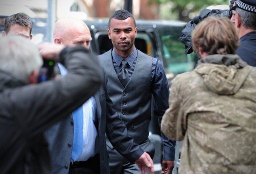 Chelsea and England footballer Ashley Cole arrives to attend the trial of his teammate John Terry