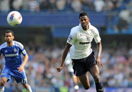 Emmanuel Adebayor (right)