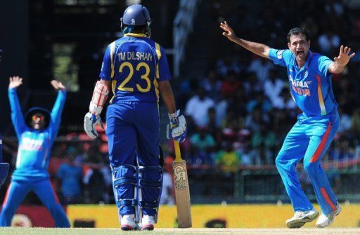 Indian bowler Irfan Pathan (right) makes an unsuccessful appeal for the wicket of Sri Lankan batsman Upul Tharanga