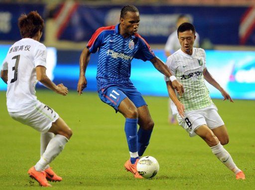 Didier Drogba scored twice on his home debut for Shanghai Shenhua