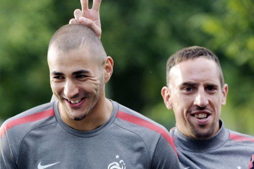 Franck Ribery (R) and Karim Benzema are among eight people facing trial in Paris