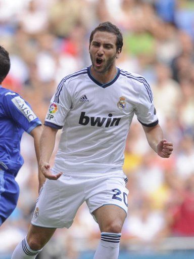 Real Madrid&#039;s Argentinian forward Gonzalo Higuain celebrates after scoring a goal