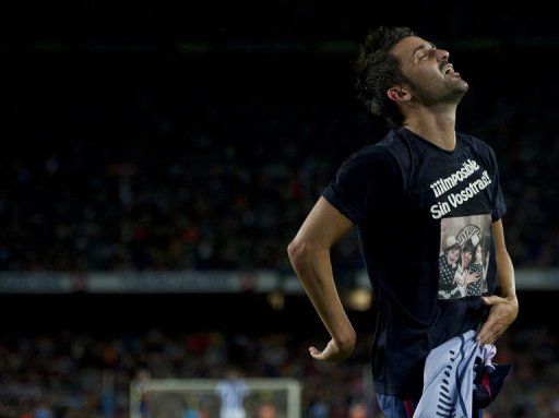 Barcelona&#039;s forward David Villa celebrates after scoring
