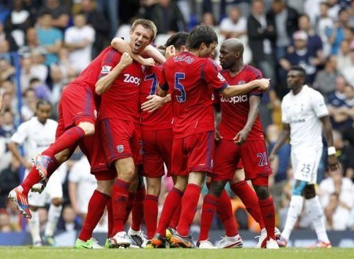 West Bromwich Albion's defender Gareth McAuley (2nd L) celebrates the goal scored by James Morrison