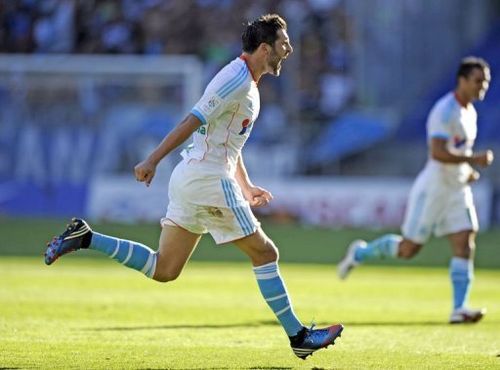 Marseille's French midfielder Andre Pierre Gignac celebrates after scoring