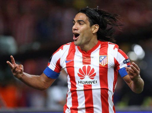 Atletico Madrid&#039;s forward Radamel Falcao celebrates after scoring a third goal