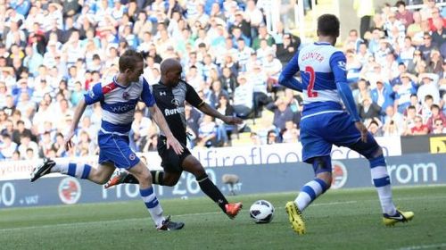 Tottenham Hotspurs's Jermain Defoe (C) scores Tottenham's third goal