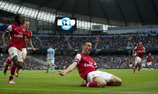 Arsenal&#039;s Laurent Koscielny celebrates scoring